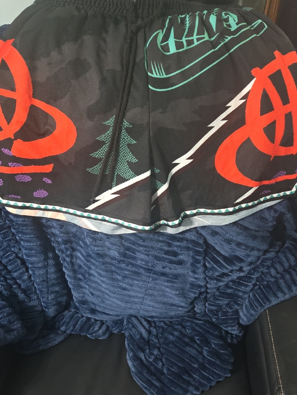 Nike Black  Shorts with Red and Teal Graphics